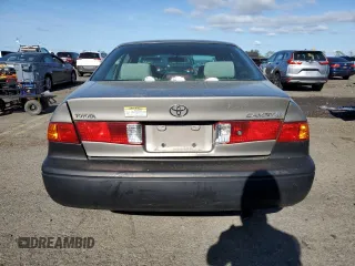 2000 Toyota Camry CE z VIN 4T1BG22K0YU692937, wystawiony jako Copart lot #57456985 z przebiegiem 116 617 mil mil oraz Szkoda całkowita • Salvage title. Historia ofert i sprzedaży dostępna na DreamBid. Obrazek 6.