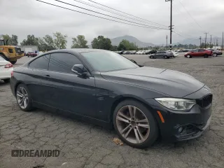 2014 BMW 4 Series 428i with VIN WBA3N7C5XEF719983, listed as a Copart auction lot 53205875 with 173,015 mi miles and Clean Title. Bid and sale history available at carsss.com. Image 4.