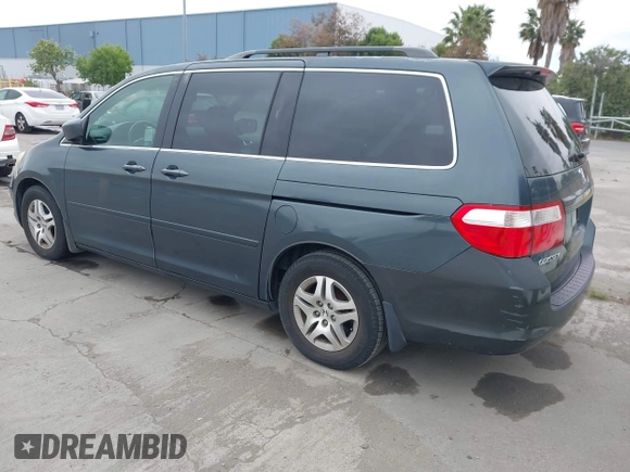 2006 Honda Odyssey EX-L with VIN 5FNRL38786B019441, listed as a IAAI auction lot 42074209 with 184,008 mi miles. Bid and sale history available at carsss.com. Image 3.