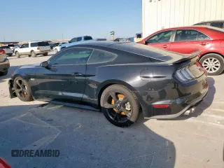 2021 Ford Mustang GT with VIN 1FA6P8CFXM5132329, listed as a Copart auction lot 52425335 with 49,262 mi miles and Salvage title. Bid and sale history available at DreamBid. Image 2.