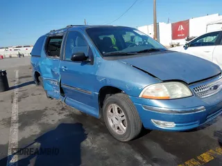 2003 Ford Windstar SE with VIN 2FMZA52413BA89058, listed as a IAAI auction lot 41348084 with 119,213 mi miles and . Bid and sale history available at carsss.com. Image 1.