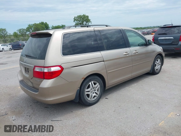 2005 Honda Odyssey EX with VIN 5FNRL38475B029026, listed as a IAAI auction lot 42489079 with 156,075 mi miles and . Bid and sale history available at DreamBid. Image 4.