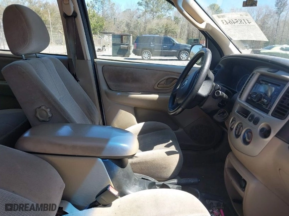 2003 Mazda Tribute LX with VIN 4F2YZ04133KM33963, listed as a IAAI auction lot 41854643 with NaN miles. Bid and sale history available at carsss.com. Image 5.