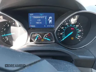 2014 Ford Escape SE z VIN 1FMCU0G99EUB25967, wystawiony jako IAAI lot #41805970 z przebiegiem 72 770 mil mil oraz . Historia ofert i sprzedaży dostępna na DreamBid. Obrazek 7.
