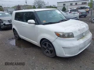 2009 Scion xB with VIN JTLKE50E491061737, listed as a IAAI auction lot 42174031 with 206,026 mi miles. Bid and sale history available at carsss.com. Image 1.