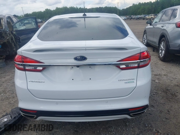 2017 Ford Fusion Titanium z VIN 3FA6P0K93HR203063, wystawiony jako IAAI lot #42243064 z przebiegiem 176 078 mil mil oraz . Historia ofert i sprzedaży dostępna na DreamBid. Obrazek 17.