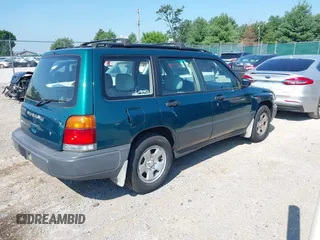 1999 Subaru Forester L with VIN JF1SF6353XH717074, listed as a IAAI auction lot 42697187 with 158,188 mi miles and . Bid and sale history available at DreamBid. Image 4.