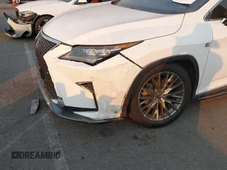 2019 Lexus RX with VIN 2T2BGMCAXKC036573, listed as a IAAI auction lot 41299079 with 104,568 mi miles. Bid and sale history available at carsss.com. Image 6.