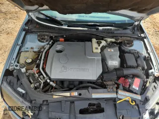 2010 Ford Fusion Hybrid z VIN 3FADP0L30AR134503, wystawiony jako Copart lot #62948515 z przebiegiem 226 913 mil mil oraz Szkoda całkowita • Salvage title. Historia ofert i sprzedaży dostępna na DreamBid. Obrazek 11.