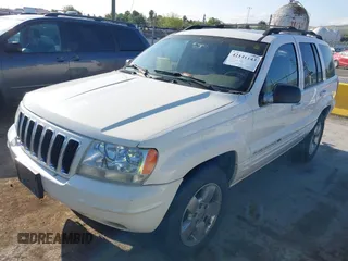 2001 Jeep Grand Cherokee Limited with VIN 1J4GW58S41C615418, listed as a IAAI auction lot 42141143 with 148,145 mi miles. Bid and sale history available at carsss.com. Image 2.
