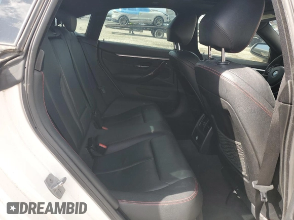 2015 BMW 4 Series 428i xDrive with VIN WBA4A7C53FD415066, listed as a Copart auction lot 61880545 with 130,874 mi miles and Salvage title. Bid and sale history available at DreamBid. Image 10.