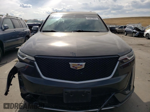 2020 Cadillac XT6 AWD Sport z VIN 1GYKPGRS3LZ109709, wystawiony jako Copart lot #75341924 z przebiegiem 60 420 mil mil oraz Szkoda całkowita • Salvage title. Historia ofert i sprzedaży dostępna na DreamBid. Obrazek 5.
