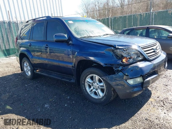 2005 Lexus GX with VIN JTJBT20XX50081621, listed as a IAAI auction lot 41661384 with 208,071 mi miles. Bid and sale history available at carsss.com. Image 1.