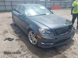 2014 Mercedes-Benz C C 250 Sport with VIN WDDGF4HB0EA936265, listed as a IAAI auction lot 42090412 with 113,695 mi miles. Bid and sale history available at carsss.com. Image 1.