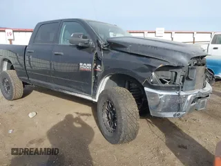 2018 Ram 2500 Tradesman z VIN 3C6UR5CL2JG232517, wystawiony jako IAAI lot #41469282 z przebiegiem Nie podano mil oraz . Historia ofert i sprzedaży dostępna na DreamBid. Obrazek 1.