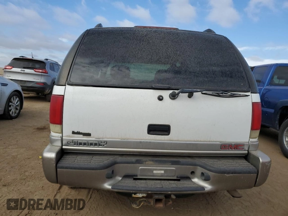 2001 GMC Jimmy SLT with VIN 1GKDT13W412121445, listed as a Copart auction lot 76842164 with 277,068 mi miles and Salvage Title. Bid and sale history available at carsss.com. Image 6.
