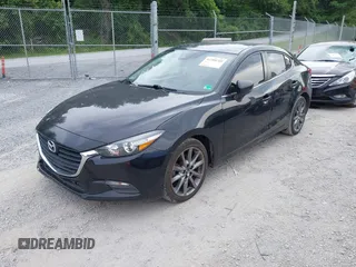 2018 Mazda 3 Touring z VIN 3MZBN1V36JM202498, wystawiony jako IAAI lot #42380709 z przebiegiem 108 930 mil mil oraz . Historia ofert i sprzedaży dostępna na DreamBid. Obrazek 20.