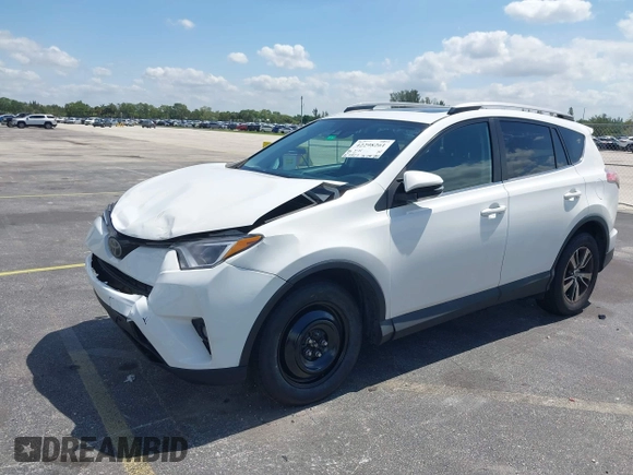 2018 Toyota RAV4 XLE with VIN 2T3WFREV9JW490324, listed as a IAAI auction lot 42298261 with 167,727 mi miles and . Bid and sale history available at DreamBid. Image 17.