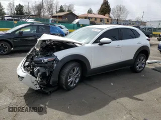 2021 Mazda CX-30 Select z VIN 3MVDMABL3MM239370, wystawiony jako Copart lot #49891555 z przebiegiem 43 217 mil mil oraz Szkoda całkowita • Salvage title. Historia ofert i sprzedaży dostępna na DreamBid. Obrazek 1.