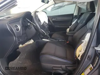 2018 Toyota Corolla L z VIN 2T1BURHE6JC112701, wystawiony jako Copart lot #55699555 z przebiegiem 54 823 mil mil oraz Szkoda całkowita • Salvage title. Historia ofert i sprzedaży dostępna na DreamBid. Obrazek 7.