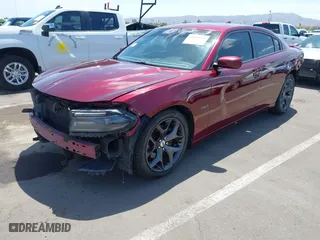 2018 Dodge Charger Daytona with VIN 2C3CDXCT3JH113264, listed as a IAAI auction lot 42053024 with 137,670 mi miles. Bid and sale history available at carsss.com. Image 2.