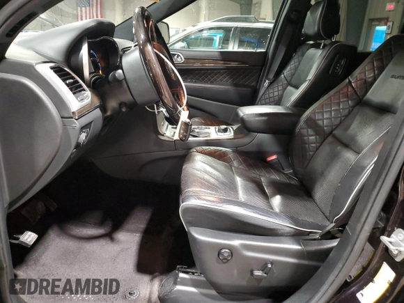 2019 Jeep Grand Cherokee Summit with VIN 1C4RJFJT7KC575200, listed as a Copart auction lot 82087644 with 122,358 mi miles and Salvage Title. Bid and sale history available at carsss.com. Image 7.
