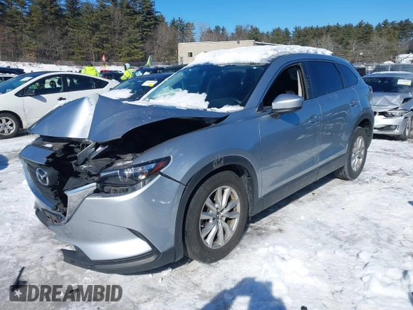 2016 Mazda CX-9 Sport with VIN JM3TCBBYXG0117878, listed as a IAAI auction lot 41617757 with 114,231 mi miles. Bid and sale history available at carsss.com. Image 2.