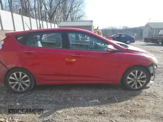 2015 Hyundai Accent Sport with VIN KMHCU5AE5FU200846, listed as a IAAI auction lot 41758805 with 84,987 mi miles. Bid and sale history available at carsss.com. Image 14.