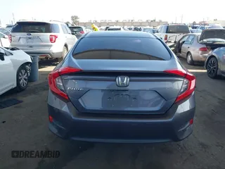 2017 Honda Civic LX z VIN 2HGFC2F53HH538362, wystawiony jako IAAI lot #42095715 z przebiegiem 156 799 mil mil oraz . Historia ofert i sprzedaży dostępna na DreamBid. Obrazek 17.
