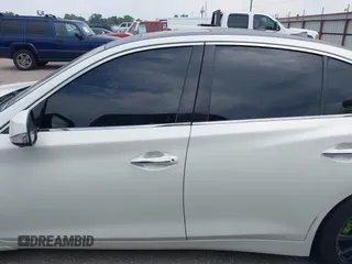 2019 Infiniti Q50 Luxe with VIN JN1EV7AP4KM510863, listed as a IAAI auction lot 42251042 with 54,156 mi miles and . Bid and sale history available at DreamBid. Image 14.