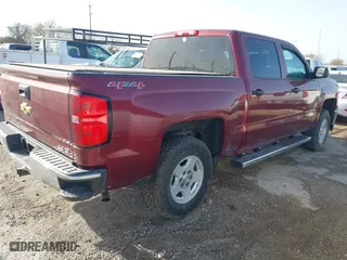 2014 Chevrolet Silverado 1500 LT with VIN 3GCUKREH4EG284122, listed as a IAAI auction lot 41667059 with 243,251 mi miles. Bid and sale history available at carsss.com. Image 4.