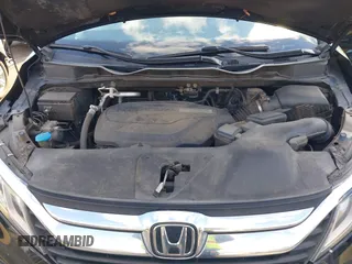 2019 Honda Odyssey EX-L with VIN 5FNRL6H74KB061567, listed as a IAAI auction lot 41810919 with 129,146 mi miles. Bid and sale history available at carsss.com. Image 10.