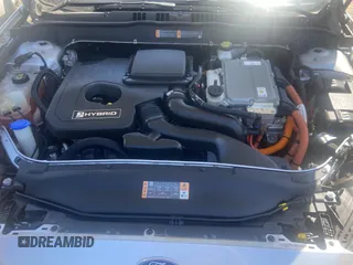 2019 Ford Fusion Hybrid SE with VIN 3FA6P0LU7KR241731, listed as a Copart auction lot 49031303 with 73,210 mi miles. Bid and sale history available at carsss.com. Image 7.