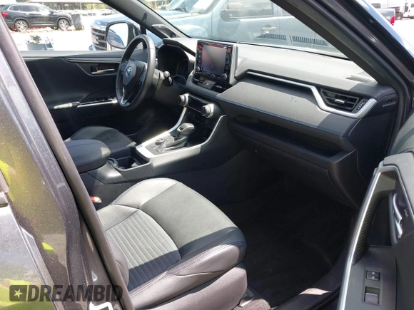 2021 Toyota RAV4 Hybrid XSE with VIN 4T3E6RFV2MU029187, listed as a IAAI auction lot 42620387 with 78,919 mi miles and . Bid and sale history available at DreamBid. Image 5.