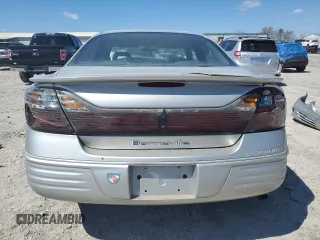2001 Pontiac Bonneville SE z VIN 1G2HX54K714188652, wystawiony jako Copart lot #49488005 z przebiegiem 157 968 mil mil oraz Tytuł czysty. Historia ofert i sprzedaży dostępna na DreamBid. Obrazek 6.