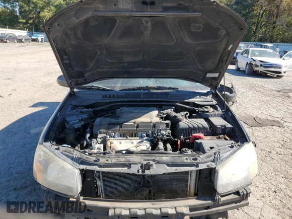 2009 Kia Spectra SX with VIN KNAFE221895022564, listed as a Copart auction lot 76997864 with 189,177 mi miles and Salvage Title. Bid and sale history available at carsss.com. Image 12.