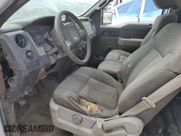 2009 Ford F-150 XL with VIN 1FTRF14W99KB43928, listed as a Copart auction lot 49001195 with 162,097 mi miles and Salvage title. Bid and sale history available at DreamBid. Image 7.