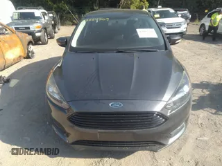 2017 Ford Focus SE with VIN 1FADP3FE3HL295192, listed as a IAAI auction lot 42664709 with 47,589 mi miles and . Bid and sale history available at DreamBid. Image 6.