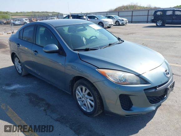 2012 Mazda 3 i Touring z VIN JM1BL1V73C1695634, wystawiony jako IAAI lot #42223477 z przebiegiem 138 302 mil mil oraz . Historia ofert i sprzedaży dostępna na DreamBid. Obrazek 1.