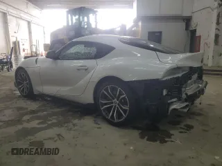2023 Toyota Supra z VIN WZ1DB2G09PW056248, wystawiony jako Copart lot #51995165 z przebiegiem 20 176 mil mil oraz Szkody całkowita. Historia ofert i sprzedaży dostępna na DreamBid. Obrazek 2.