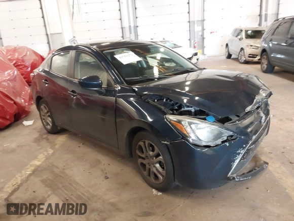 2016 Scion iA z VIN 3MYDLBZV5GY103533, wystawiony jako IAAI lot #41756270 z przebiegiem 59 290 mil mil oraz . Historia ofert i sprzedaży dostępna na DreamBid. Obrazek 1.