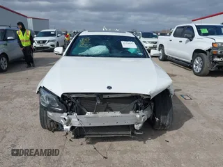 2019 Mercedes-Benz E-Class E 300 with VIN WDDZF4JB0KA512311, listed as a IAAI auction lot 41720142 with 93,714 mi miles. Bid and sale history available at carsss.com. Image 12.