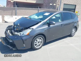 2015 Toyota Prius Two with VIN JTDZN3EUXFJ027926, listed as a IAAI auction lot 42036024 with 104,976 mi miles and . Bid and sale history available at DreamBid. Image 2.
