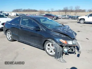 2007 Honda Civic Cpe EX with VIN 2HGFG12807H537084, listed as a IAAI auction lot 41692336 with 157,767 mi miles. Bid and sale history available at carsss.com. Image 1.