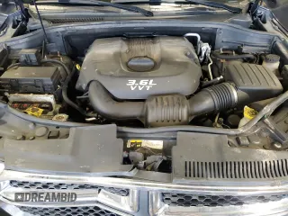 2013 Dodge Durango Crew with VIN 1C4RDJDG2DC663518, listed as a Copart auction lot 62736515 with 226,720 mi miles and Salvage title. Bid and sale history available at DreamBid. Image 12.