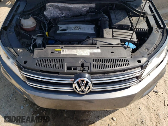 2017 Volkswagen Tiguan S z VIN WVGAV7AX9HK018499, wystawiony jako Copart lot #62606655 z przebiegiem 77 991 mil mil oraz Szkoda całkowita • Salvage title. Historia ofert i sprzedaży dostępna na DreamBid. Obrazek 11.