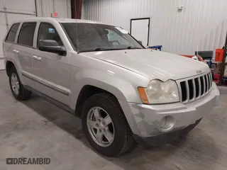2007 Jeep Grand Cherokee Laredo with VIN 1J8GR48K57C687365, listed as a IAAI auction lot 42038456 with 162,343 mi miles. Bid and sale history available at carsss.com. Image 1.