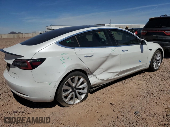 2020 Tesla Model 3 Long Range with VIN 5YJ3E1EB8LF712308, listed as a Copart auction lot 53265405 with 65,262 mi miles and Salvage Title. Bid and sale history available at DreamBid. Image 3.