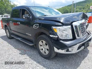 2017 Nissan Titan SV with VIN 1N6AA1E58HN542504, listed as a IAAI auction lot 42564921 with 161,555 mi miles and . Bid and sale history available at DreamBid. Image 1.