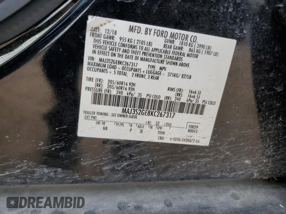 2019 Ford EcoSport SE z VIN MAJ3S2GE8KC267317, wystawiony jako Copart lot #53885175 z przebiegiem 51 737 mil mil oraz Szkody całkowita. Historia ofert i sprzedaży dostępna na DreamBid. Obrazek 13.